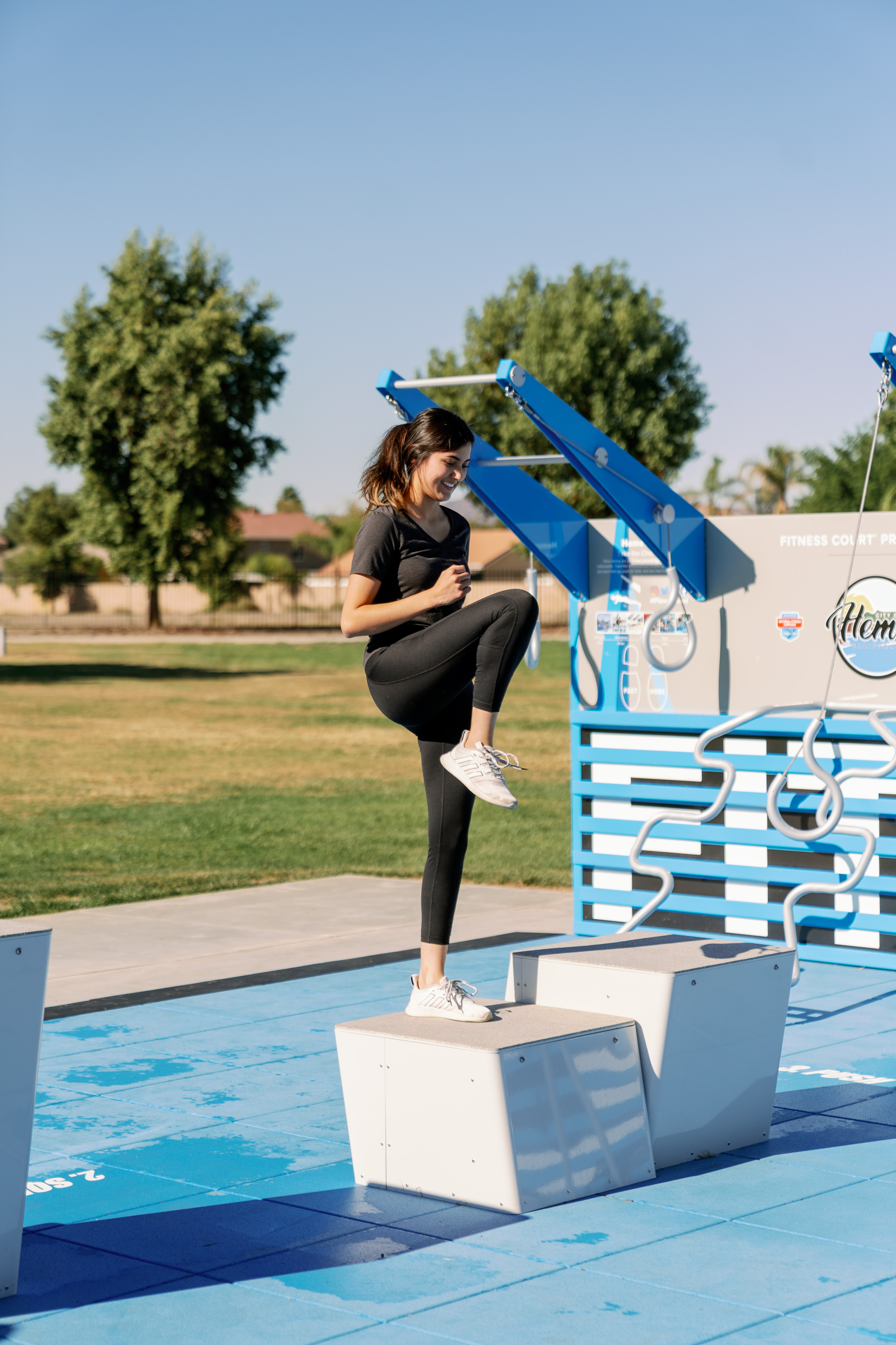girl doing step up at lunge station on a Fitness Court