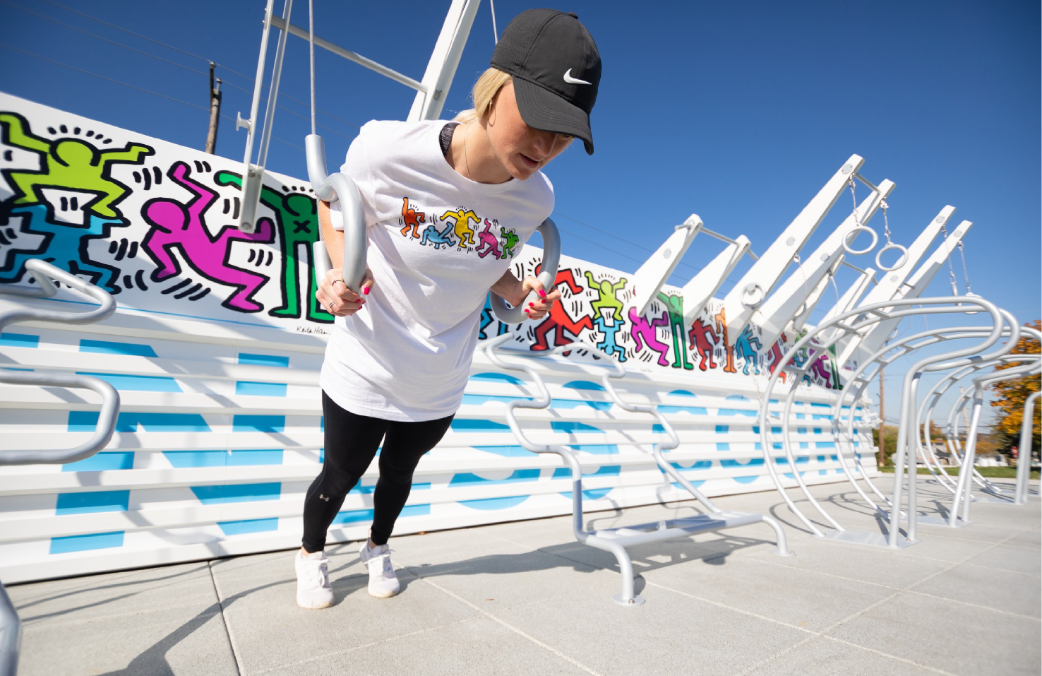 girl doing push up on push station on Fitness Court